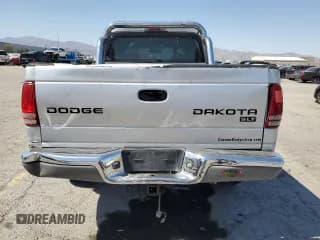 ✅ 2004 Dodge Dakota SLT • VIN: 1D7HG48N74S509797 • Lot: 57797055. Wystawiony na Copart z przebiegiem 214 275 mil. Bezpłatny archiwum sprzedaży aukcyjnych z USA i szczegółowy raport historii pojazdu na DreamBid. Zdjęcie 6.