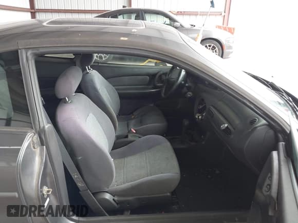 ✅ 2002 Ford Escort ZX2 Standard • VIN: 3FAFP11342R224496 • Lot: 42600886. Wystawiony na IAAI z przebiegiem 164 189 mil. Bezpłatny archiwum sprzedaży aukcyjnych z USA i szczegółowy raport historii pojazdu na DreamBid. Zdjęcie 5.