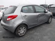 ✅ 2012 Mazda 2 Sport • VIN: JM1DE1KZ2C0145209 • Lot: 43779983. Listed on IAAI with 74,127 mi. Free auction sales archive from the USA and detailed vehicle history report at DreamBid. Image 4.