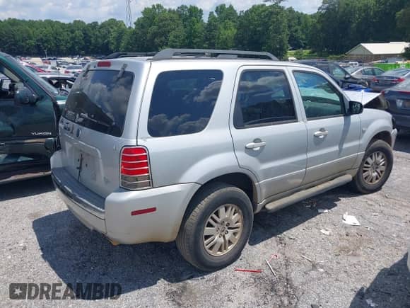 2005 Mercury Mariner Luxury z VIN 4M2YU561X5DJ09502, wystawiony jako IAAI lot #37069354 z przebiegiem Nie podano mil oraz . Historia ofert i sprzedaży dostępna na DreamBid. Obrazek 4.