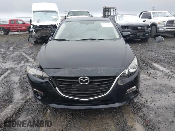 ✅ 2016 Mazda 3 i Sport • VIN: JM1BM1T7XG1308342 • Lot: 41518407. Listed on IAAI with 194,967 mi. Free auction sales archive from the USA and detailed vehicle history report at DreamBid. Image 12.