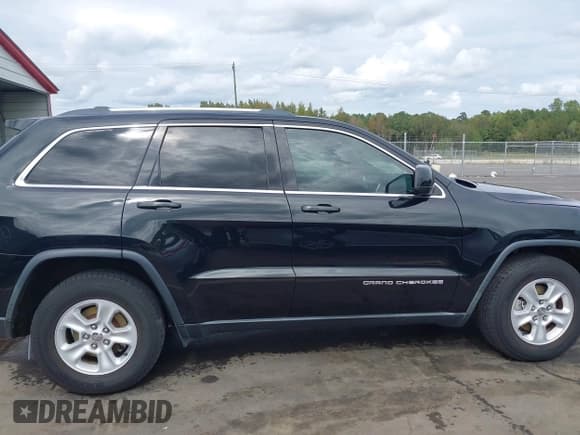 ✅ 2015 Jeep Grand Cherokee Laredo • VIN: 1C4RJEAG0FC109028 • Лот: 43355470. Опубликован ранее на IAAI с пробегом 82 062 миль. Бесплатный доступ к архиву аукционных продаж из США и подробный отчёт об истории автомобиля на DreamBid. Изображение 13.