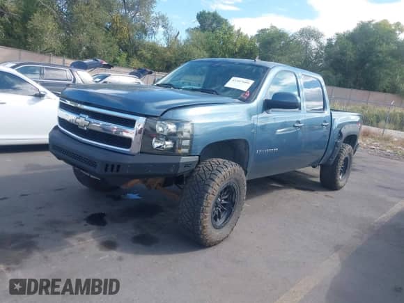 2007 Chevrolet Silverado 1500 1LT with VIN 2GCEK13MX71620793, listed as a IAAI auction lot 43307609 with 152,249 mi miles and . Bid and sale history available at DreamBid. Image 17.