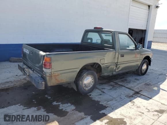✅ 1994 Isuzu Pickup S • VIN: JAACL11L2R7221226 • Лот: 59027295. Опубликован ранее на Copart с пробегом 129 494 миль. Бесплатный доступ к архиву аукционных продаж из США и подробный отчёт об истории автомобиля на DreamBid. Изображение 3.