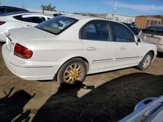 2004 Hyundai Sonata GLS with VIN KMHWF35HX4A975027, listed as a Copart auction lot 82652354 with 148,296 mi miles and Salvage title. Bid and sale history available at DreamBid. Image 3.