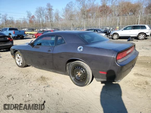 ✅ 2014 Dodge Challenger SXT • VIN: 2C3CDYAG2EH233980 • Lot: 46654383. Listed on Copart with 101,112 mi. Free auction sales archive from the USA and detailed vehicle history report at DreamBid. Image 2.