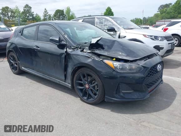 2019 Hyundai Veloster Turbo z VIN KMHTH6AB4KU011518, wystawiony jako IAAI lot #42037553 z przebiegiem 134 250 mil mil oraz . Historia ofert i sprzedaży dostępna na DreamBid. Obrazek 1.