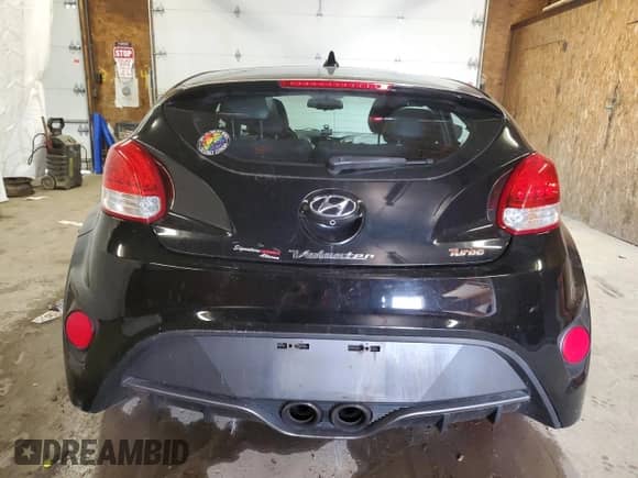 2015 Hyundai Veloster Turbo z VIN KMHTC6AE5FU226436, wystawiony jako Copart lot #49742034 z przebiegiem 99 852 mil mil oraz . Historia ofert i sprzedaży dostępna na DreamBid. Obrazek 6.
