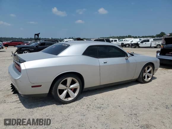 2009 Dodge Challenger SRT-8 z VIN 2B3LJ74W89H503304, wystawiony jako Copart lot #66750884 z przebiegiem Nie podano mil oraz Czysty tytuł • Clean title. Historia ofert i sprzedaży dostępna na DreamBid. Obrazek 3.
