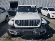 ✅ 2024 Jeep Wrangler Sahara • VIN: 1C4PJXEG6RW312862 • Lot: 48125215. Listed on Copart with 3,915 mi. Free auction sales archive from the USA and detailed vehicle history report at DreamBid. Image 5.