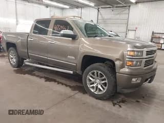 ✅ 2014 Chevrolet Silverado 1500 High Country • VIN: 3GCUKTEJ2EG497215 • Лот: 41729452. Опубликован ранее на IAAI с пробегом 125 538 миль. Бесплатный доступ к архиву аукционных продаж из США и подробный отчёт об истории автомобиля на DreamBid. Изображение 1.