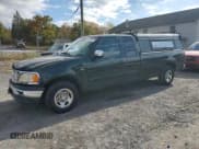 ✅ 2001 Ford F-150 XL • VIN: 1FTRX17W11NB70374 • Lot: 89612325. Listed on Copart with 124,157 mi. Free auction sales archive from the USA and detailed vehicle history report at DreamBid. Image 1.