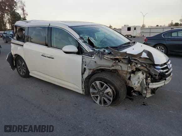 ✅ 2015 Honda Odyssey Touring Elite • VIN: 5FNRL5H96FB059269 • Lot: 94325465. Listed on Copart with 146,876 mi. Free auction sales archive from the USA and detailed vehicle history report at DreamBid. Image 4.