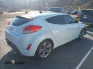 ✅ 2013 Hyundai Veloster w/Black Int • VIN: KMHTC6AD5DU101733 • Lot: 41425260. Wystawiony na IAAI z przebiegiem 139 500 mil. Bezpłatny archiwum sprzedaży aukcyjnych z USA i szczegółowy raport historii pojazdu na DreamBid. Zdjęcie 4.