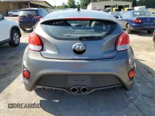 2015 Hyundai Veloster Turbo z VIN KMHTC6AE4FU226654, wystawiony jako Copart lot #66722554 z przebiegiem 69 620 mil mil oraz Szkoda całkowita • Salvage title. Historia ofert i sprzedaży dostępna na DreamBid. Obrazek 6.