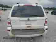 2011 Mercury Mariner z VIN 4M2CN8B71BKJ01749, wystawiony jako Copart lot #64199345 z przebiegiem 157 001 mil mil oraz Szkoda całkowita • Salvage title. Historia ofert i sprzedaży dostępna na DreamBid. Obrazek 6.