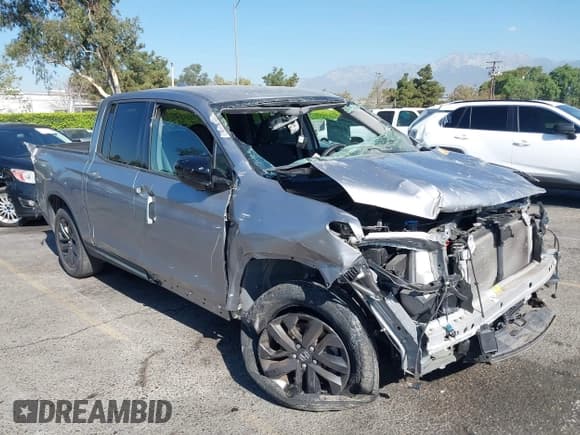 ✅ 2022 Honda Ridgeline Sport • VIN: 5FPYK3F16NB000566 • Lot: 43099564. Wystawiony na IAAI z przebiegiem Nie podano. Bezpłatny archiwum sprzedaży aukcyjnych z USA i szczegółowy raport historii pojazdu na DreamBid. Zdjęcie 1.