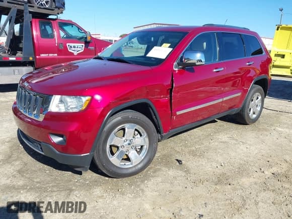 ✅ 2013 Jeep Grand Cherokee Limited • VIN: 1C4RJEBG7DC626452 • Lot: 43589955. Listed on IAAI with 105,171 mi. Free auction sales archive from the USA and detailed vehicle history report at DreamBid. Image 2.