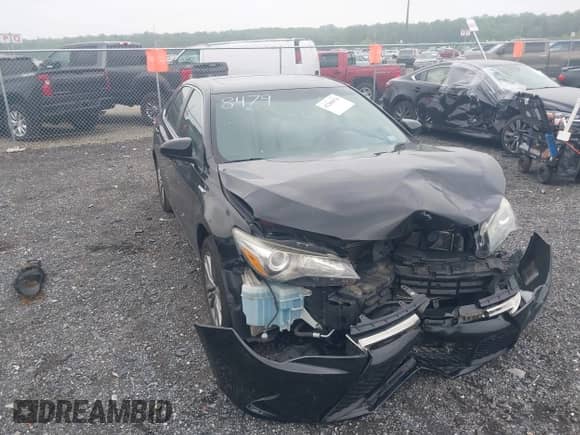 2016 Toyota Camry LE z VIN 4T1BD1FK8GU198479, wystawiony jako IAAI lot #42280676 z przebiegiem 106 521 mil mil oraz . Historia ofert i sprzedaży dostępna na DreamBid. Obrazek 1.