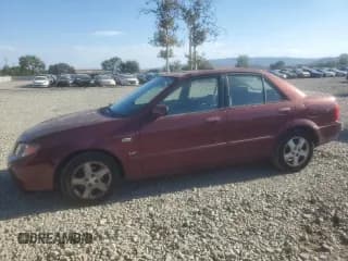 ✅ 2002 Mazda Protege DX • VIN: JM1BJ225921608283 • Lot: 80679005. Wystawiony na Copart z przebiegiem 147 000 mil. Bezpłatny archiwum sprzedaży aukcyjnych z USA i szczegółowy raport historii pojazdu na DreamBid. Zdjęcie 1.