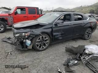 ✅ 2018 Chevrolet Impala Premier • VIN: 2G1125S35J9104258 • Lot: 53988445. Listed on Copart with 128,949 mi. Free auction sales archive from the USA and detailed vehicle history report at DreamBid. Image 1.