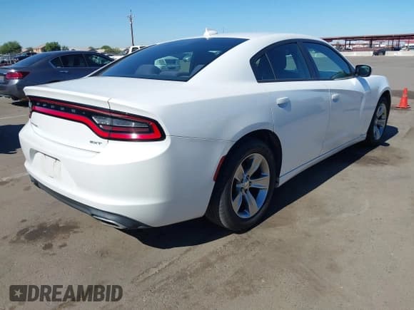 ✅ 2015 Dodge Charger SXT • VIN: 2C3CDXHG8FH824400 • Lot: 43550526. Listed on IAAI with 115,887 mi. Free auction sales archive from the USA and detailed vehicle history report at DreamBid. Image 4.