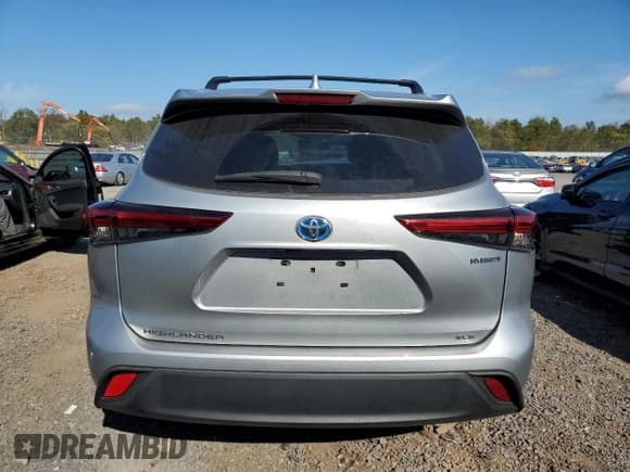 ✅ 2022 Toyota Highlander Hybrid XLE • VIN: 5TDGBRCH6NS552363 • Лот: 85730545. Опубликован ранее на Copart с пробегом 80 591 миль. Бесплатный доступ к архиву аукционных продаж из США и подробный отчёт об истории автомобиля на DreamBid. Изображение 6.