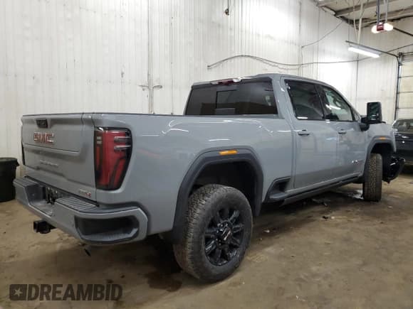 ✅ 2024 GMC Sierra 3500 • VIN: 1GT49VE73RF465831 • Lot: 81821764. Listed on Copart with 8,768 mi. Free auction sales archive from the USA and detailed vehicle history report at DreamBid. Image 3.