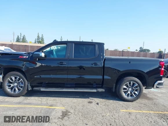 ✅ 2023 Chevrolet Silverado 1500 LT • VIN: 1GCUDDED8PZ311819 • Lot: 42205563. Listed on IAAI with 26,701 mi. Free auction sales archive from the USA and detailed vehicle history report at DreamBid. Image 14.