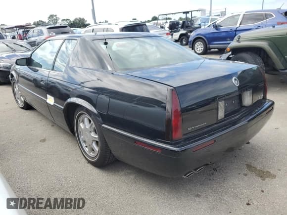 ✅ 2002 Cadillac Eldorado Touring • VIN: 1G6ET12912B102383 • Лот: 75119604. Опубликован ранее на Copart с пробегом Не указан. Бесплатный доступ к архиву аукционных продаж из США и подробный отчёт об истории автомобиля на DreamBid. Изображение 2.