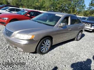 2006 Hyundai Azera SE z VIN KMHFC46F36A034811, wystawiony jako Copart lot #81995815 z przebiegiem 59 775 mil mil oraz Czysty tytuł • Clean title. Historia ofert i sprzedaży dostępna na DreamBid. Obrazek 1.