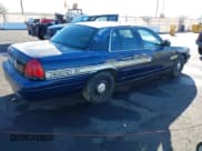 ✅ 2004 Ford Police Interceptor Base w/3.27 Axle • VIN: 2FAFP71W54X101274 • Lot: 41164206. Wystawiony na IAAI z przebiegiem 128 237 mil. Bezpłatny archiwum sprzedaży aukcyjnych z USA i szczegółowy raport historii pojazdu na DreamBid. Zdjęcie 4.