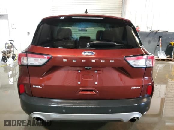 ✅ 2021 Ford Escape SEL • VIN: 1FMCU9H61MUA64038 • Lot: 60610675. Listed on Copart with 106,605 mi. Free auction sales archive from the USA and detailed vehicle history report at DreamBid. Image 6.