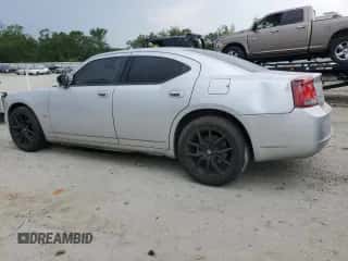 2009 Dodge Charger SXT с VIN 2B3KA33V69H504044, выставлен на аукционе Copart как лот 54199914 с пробегом 214 200 миль миль и Списание • Salvage title. История ставок и продаж доступна на DreamBid. Изображение 2.