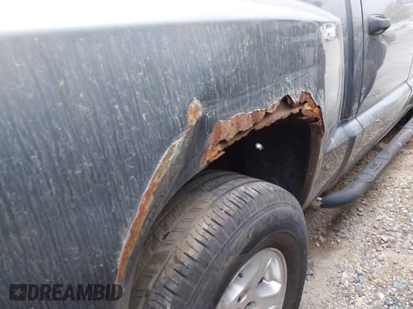 2006 Dodge Dakota SLT with VIN 1D7HE48N06S580705, listed as a IAAI auction lot 42120728 with 206,420 mi miles and . Bid and sale history available at DreamBid. Image 16.