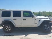 ✅ 2021 Jeep Wrangler Unlimited Rubicon • VIN: 1C4HJXFG5MW586842 • Lot: 42186683. Listed on IAAI with 76,450 mi. Free auction sales archive from the USA and detailed vehicle history report at DreamBid. Image 13.