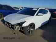 2019 Hyundai Veloster Premium with VIN KMHTG6AF3KU019356, listed as a IAAI auction lot 41765937 with 120,079 mi miles and . Bid and sale history available at DreamBid. Image 2.