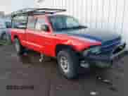 2002 Dodge Dakota SLT with VIN 1B7GL42N52S505626, listed as a IAAI auction lot 41552396 with 255,927 mi miles and . Bid and sale history available at DreamBid. Image 1.