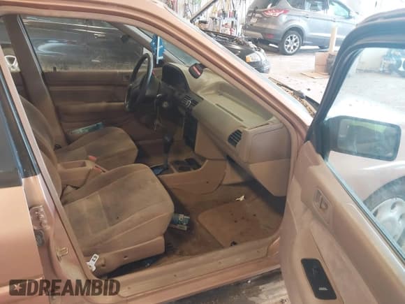 ✅ 1994 Ford Escort • VIN: 1FARP15J3RW212935 • Lot: 42595461. Listed on IAAI with 90,056 mi. Free auction sales archive from the USA and detailed vehicle history report at DreamBid. Image 5.