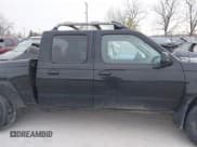 ✅ 2002 Nissan Frontier SE • VIN: 1N6ED29Y32C366211 • Lot: 41250598. Listed on IAAI with 135,280 mi. Free auction sales archive from the USA and detailed vehicle history report at DreamBid. Image 13.