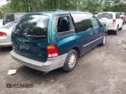 ✅ 1999 Ford Windstar LX • VIN: 2FMDA5145XBB06655 • Lot: 42854536. Wystawiony na IAAI z przebiegiem 130 021 mil. Bezpłatny archiwum sprzedaży aukcyjnych z USA i szczegółowy raport historii pojazdu na DreamBid. Zdjęcie 4.