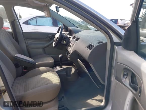 ✅ 2005 Ford Focus S • VIN: 1FAFP34NX5W112117 • Lot: 43689757. Listed on IAAI with 187,624 mi. Free auction sales archive from the USA and detailed vehicle history report at DreamBid. Image 5.