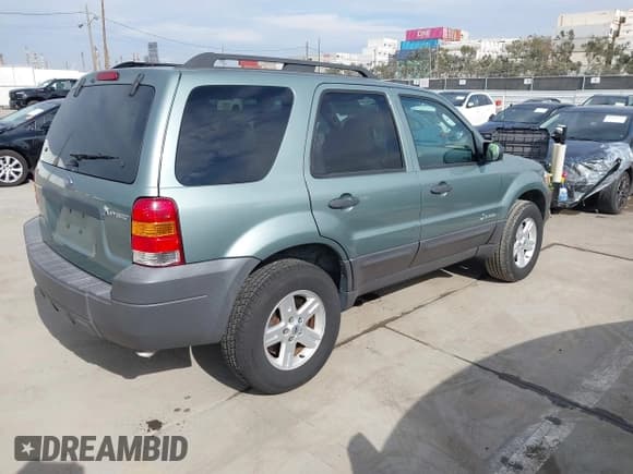 ✅ 2007 Ford Escape Hybrid • VIN: 1FMCU49H27KA67453 • Lot: 43680134. Listed on IAAI with 33,713 mi. Free auction sales archive from the USA and detailed vehicle history report at DreamBid. Image 4.