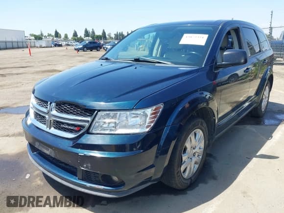✅ 2014 Dodge Journey American Value • VIN: 3C4PDCAB1ET287590 • Lot: 43072351. Listed on IAAI with 149,217 mi. Free auction sales archive from the USA and detailed vehicle history report at DreamBid. Image 2.