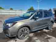 2018 Subaru Forester Touring z VIN JF2SJGWC8JH511119, wystawiony jako Copart lot #80750065 z przebiegiem 86 471 mil mil oraz Szkoda całkowita • Salvage title. Historia ofert i sprzedaży dostępna na DreamBid. Obrazek 1.