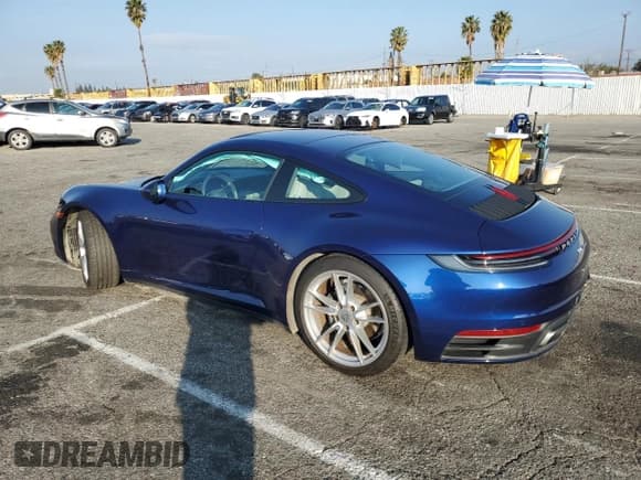 ✅ 2022 Porsche 911 Carrera • VIN: WP0AA2A99NS205256 • Lot: 43082515. Listed on Copart with 21,682 mi. Free auction sales archive from the USA and detailed vehicle history report at DreamBid. Image 2.