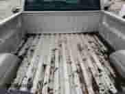 2006 Chevrolet Silverado 1500 Work Truck z VIN 3GCEK14X56G232594, wystawiony jako Copart lot #64507464 z przebiegiem 129 329 mil mil oraz Czysty tytuł • Clean title. Historia ofert i sprzedaży dostępna na DreamBid. Obrazek 10.