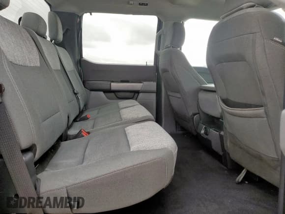 ✅ 2023 Ford F-150 XL • VIN: 1FTEW1C87PKD34956 • Lot: 67405025. Wystawiony na Copart z przebiegiem 62 087 mil. Bezpłatny archiwum sprzedaży aukcyjnych z USA i szczegółowy raport historii pojazdu na DreamBid. Zdjęcie 10.