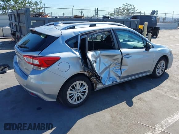✅ 2018 Subaru Impreza Premium • VIN: 4S3GTAD62J3752616 • Lot: 43120942. Listed on IAAI with 99,641 mi. Free auction sales archive from the USA and detailed vehicle history report at DreamBid. Image 4.