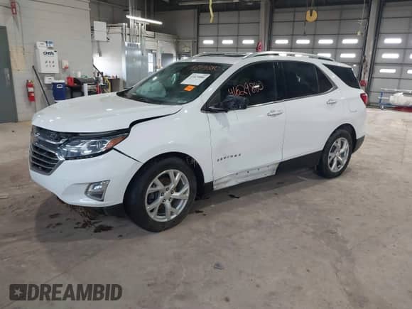 2018 Chevrolet Equinox Premier с VIN 3GNAXPEU1JS542875, выставлен на аукционе IAAI как лот 41629880 с пробегом 159 870 миль миль и . История ставок и продаж доступна на DreamBid. Изображение 17.